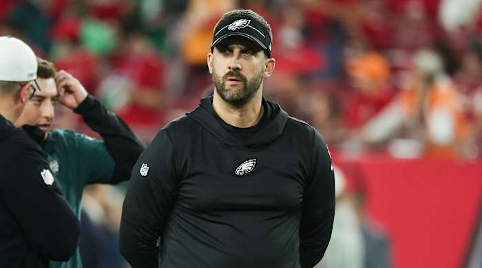 Nick Sirianni looks out from the sideline during an Eagles playoff game